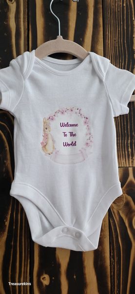 Blue Peter Rabbit pink welcome to the world baby vest