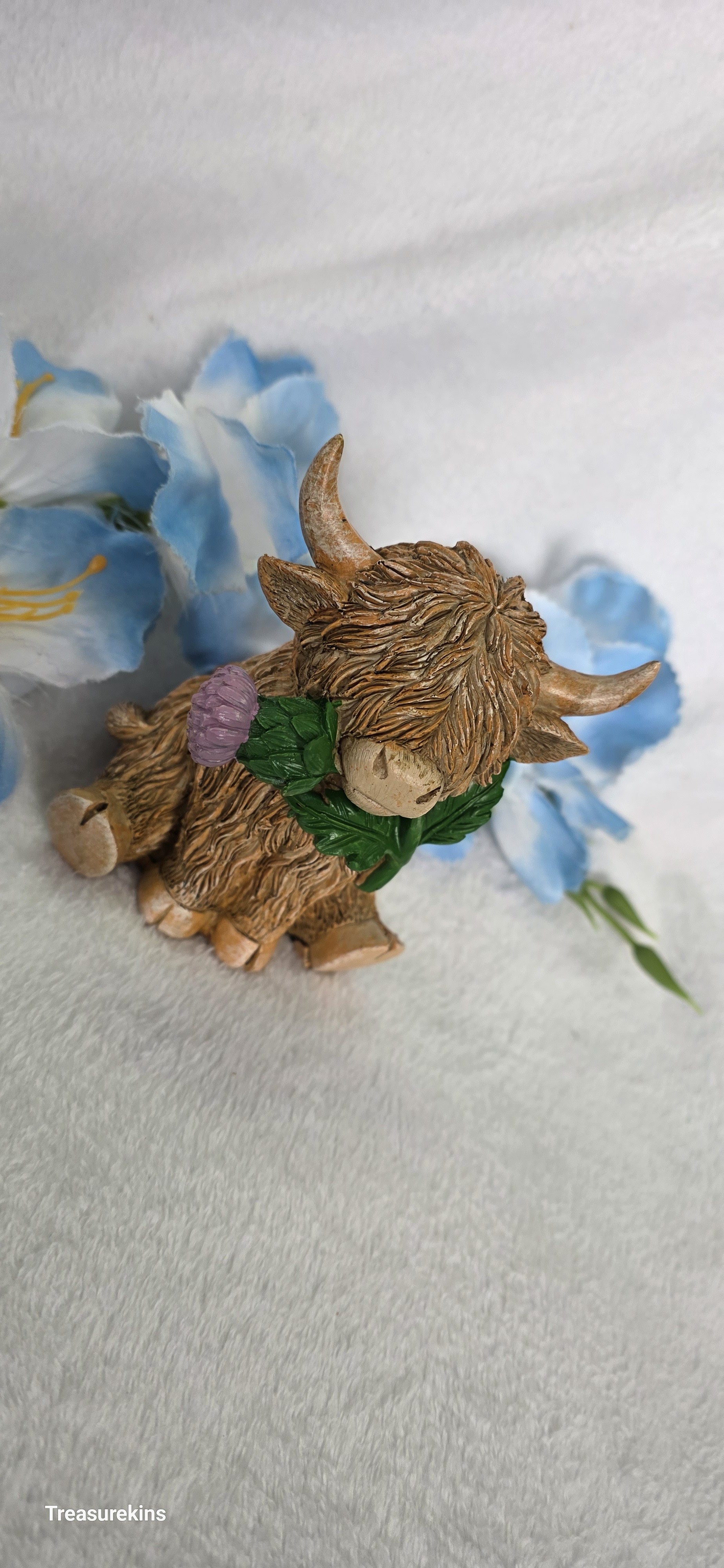 Happy Highland Cow Thistle figure