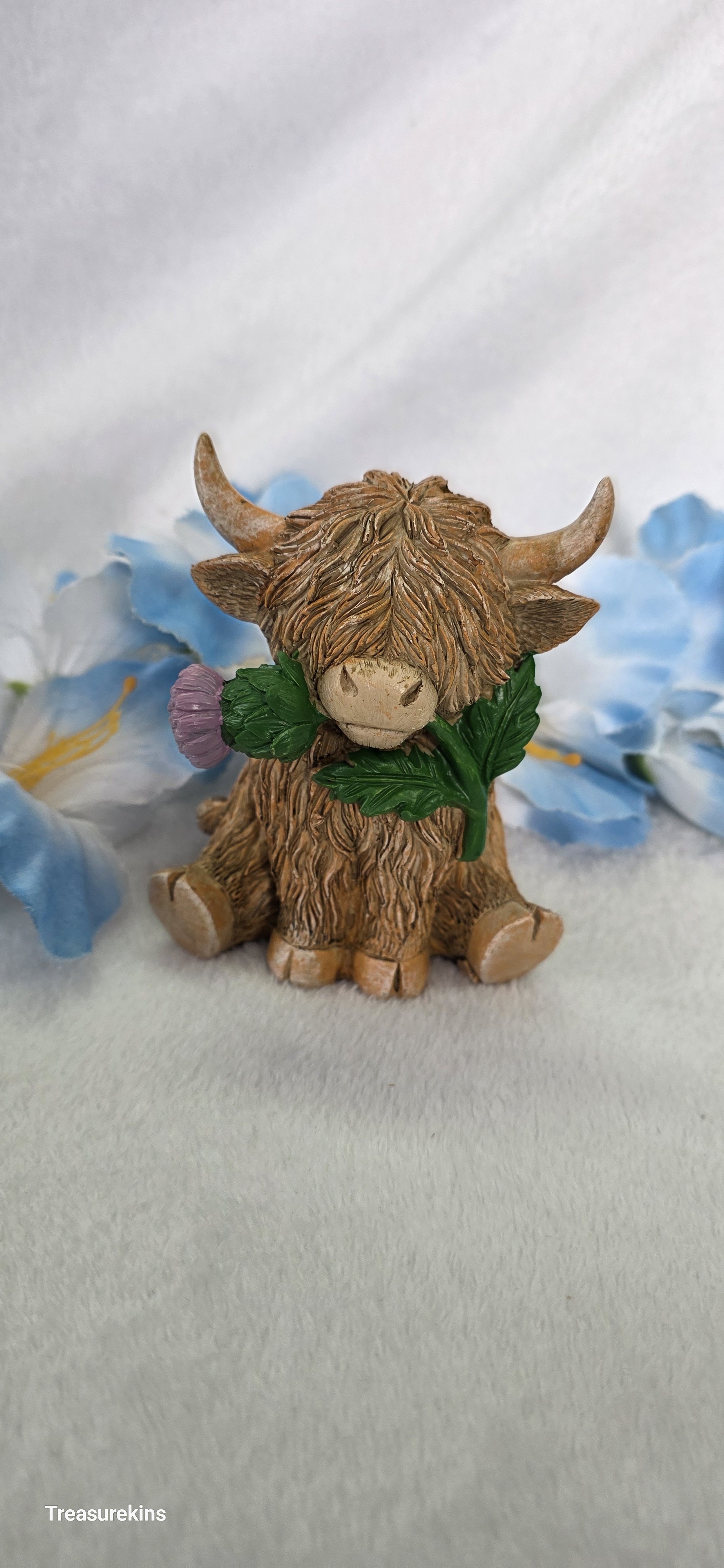 Happy Highland Cow Thistle figure
